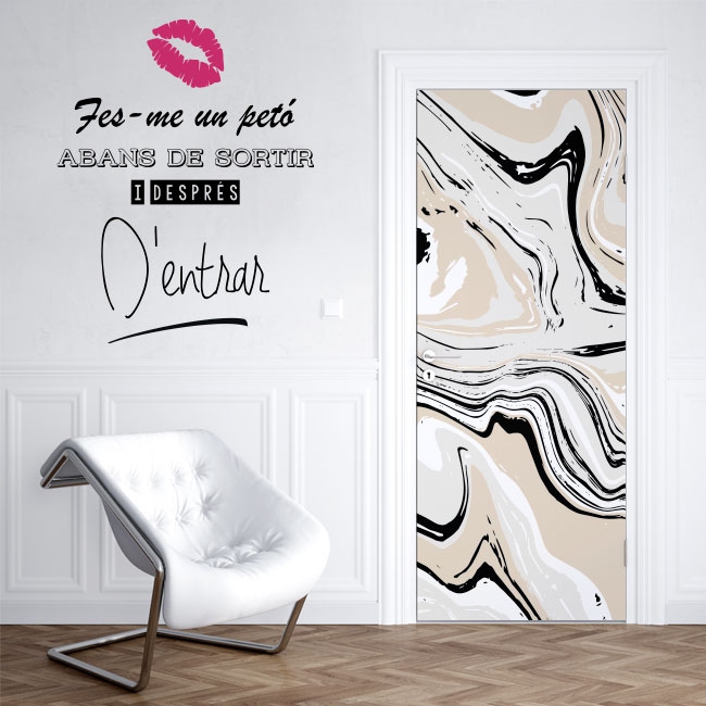 Vinyl decals with the phrase kiss me before leaving in catalan